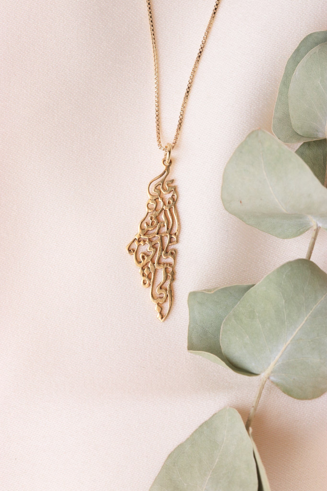 Palestine map with Palestinian famous poem written inside necklace