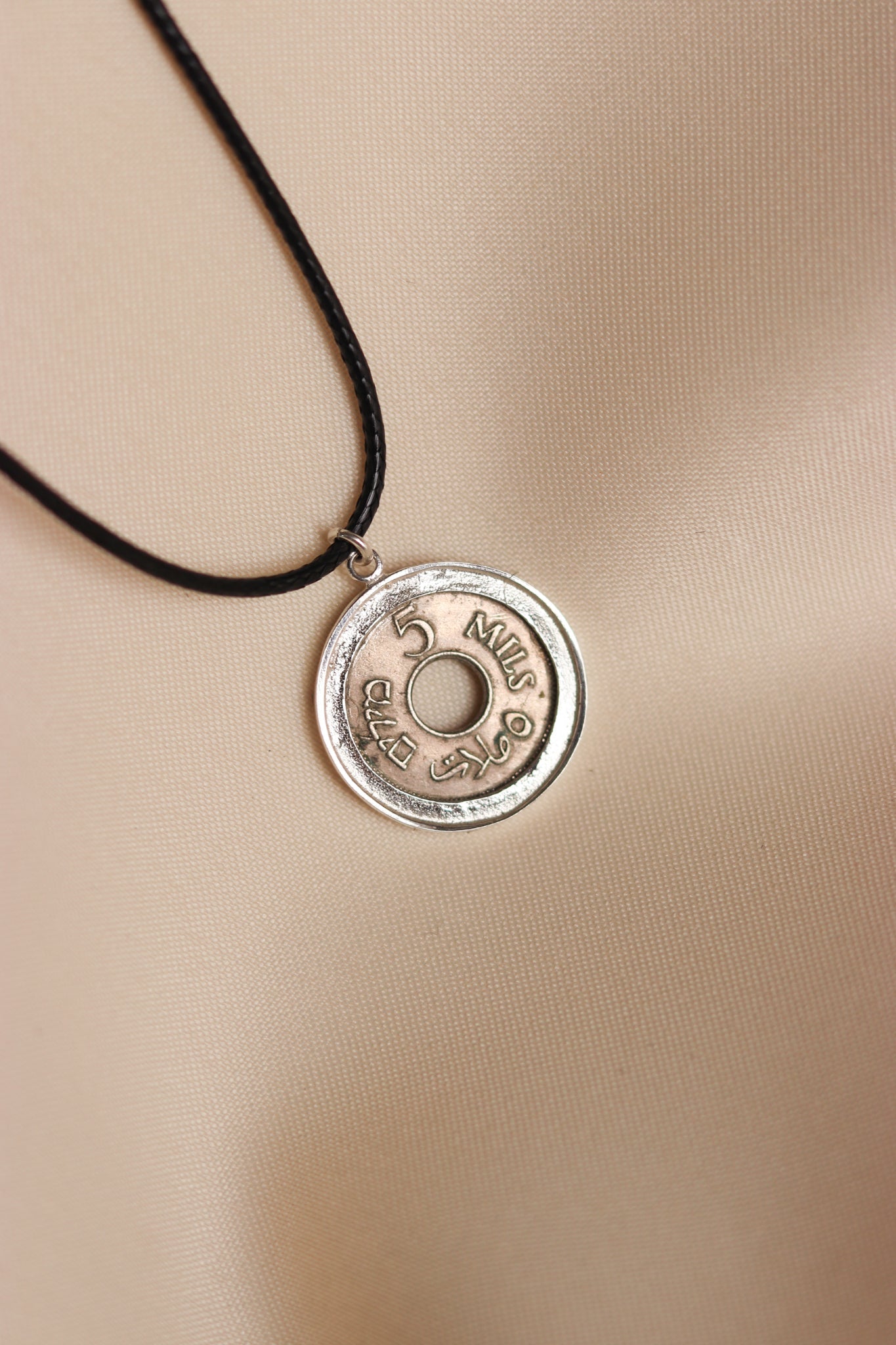 Palestinian coin 5 mil braided frame leather necklace