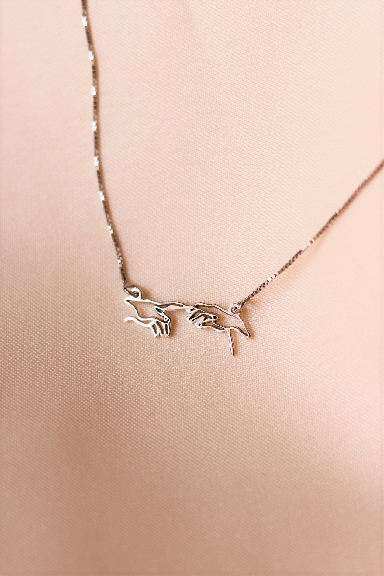 The creation of Adam hands necklace