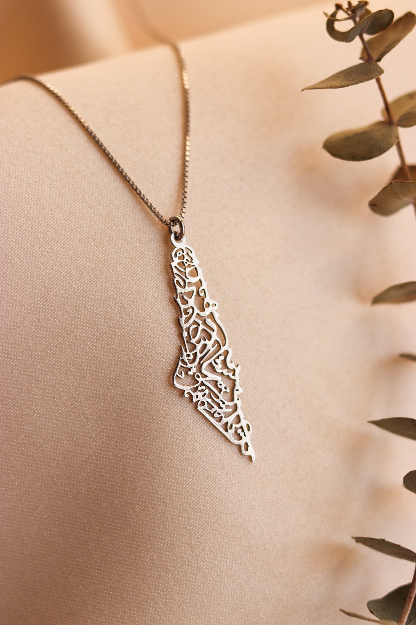 Palestine map with Palestinian famous poem written inside necklace